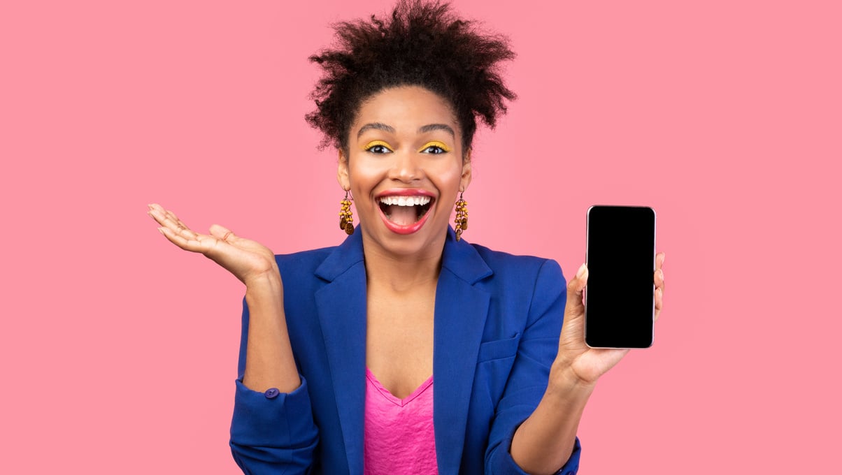 Black girl showing blank cell phone screen